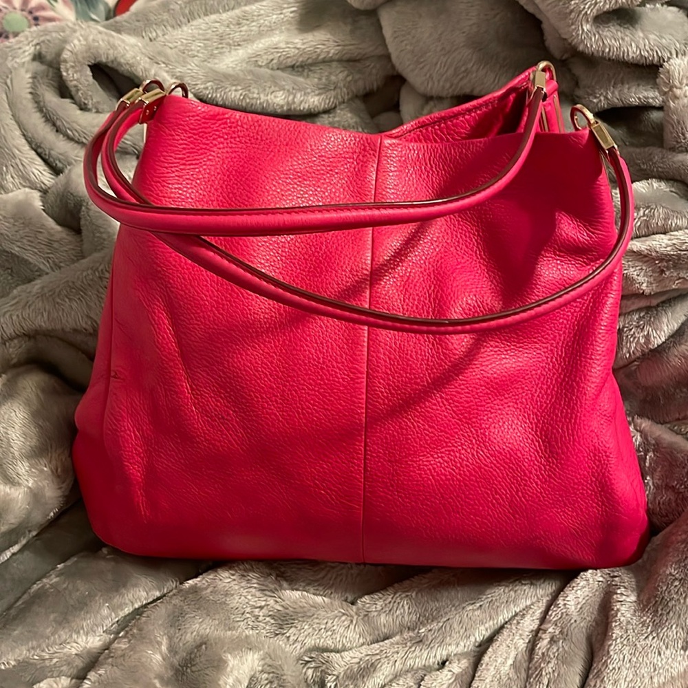 Hot pink over the shoulder Coach bag